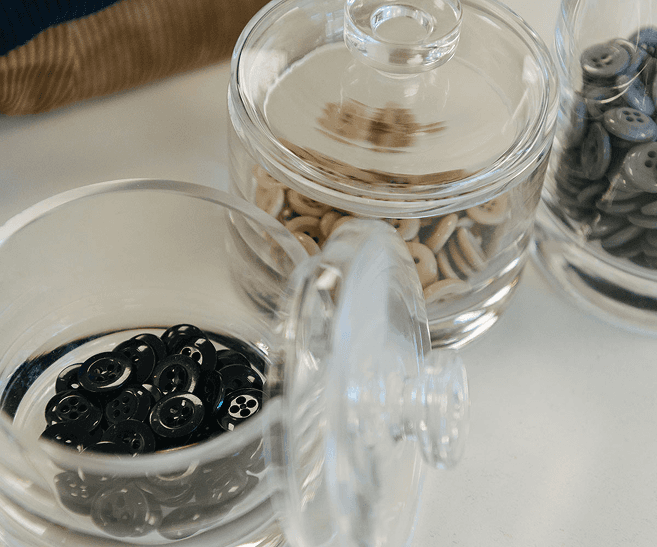 Jar of suspender buttons