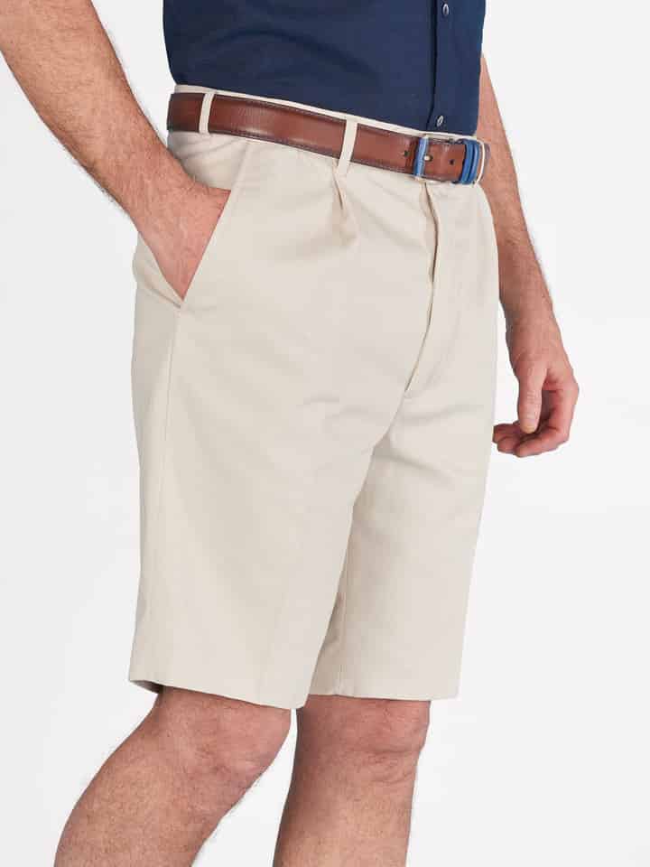 Model wears Men's Stone Beige Cotton Pleated Dress Shorts