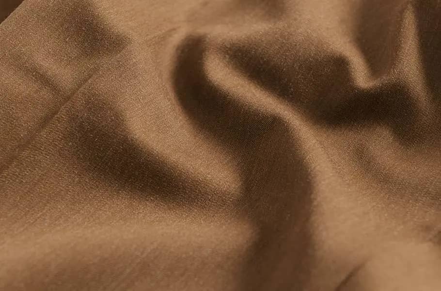 mens-tan-brown-wool-and-silk-trousers-fabric-detail.webp